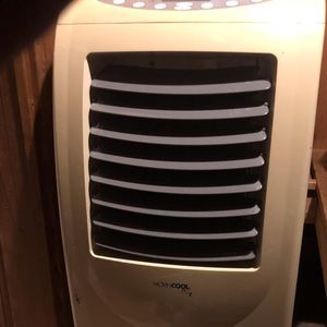 AC/HEATER MOVINCOOL ON WHEELS THAT PLUGS INWALL...
